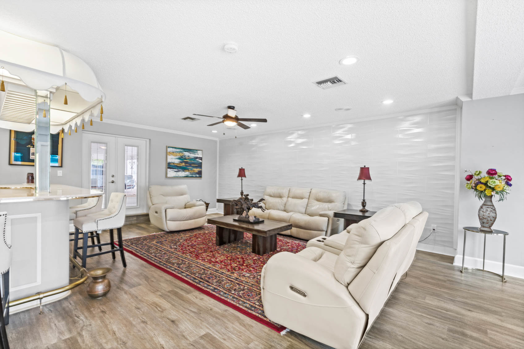 living room with white couches